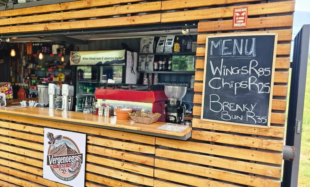 The Vergenoeg Cafe counter with the day's menu board